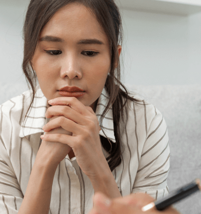 Young woman thinking during an NYSHIP intensive outpatient program assessment with a therapist